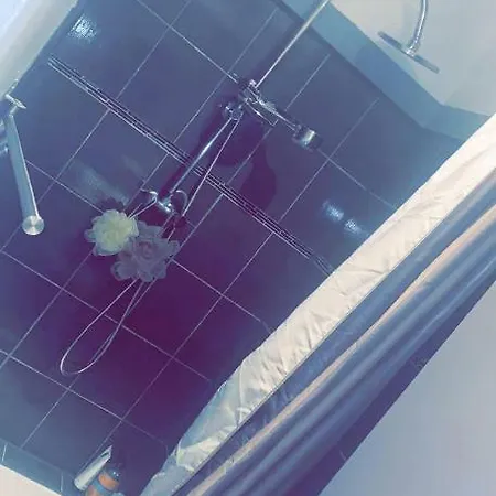 Quarto em Acomodações Particulares Versace