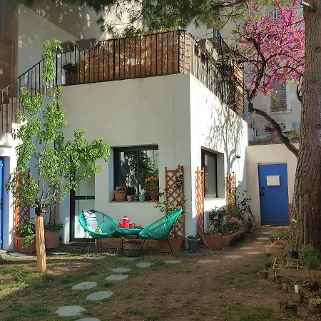 Little House With A Large Roof Garden In The Center *